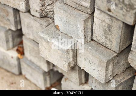 Texture of stacked concrete paving slabs as background, closeup Stock Photo
