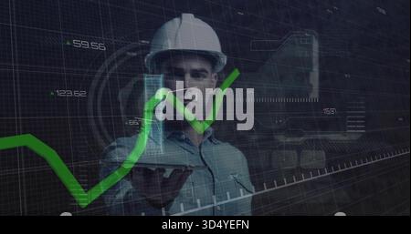 Showing engineer wearing white helmet light shirt holding hologram tower at AR lab green graph HUD Stock Photo