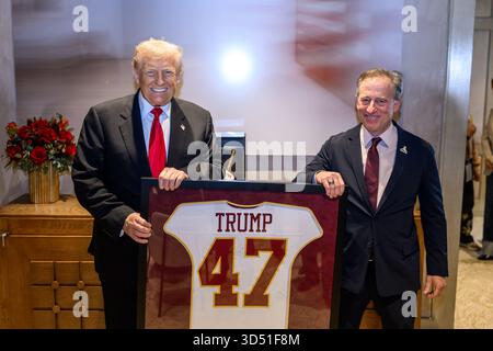 President Donald Trump poses for photos with Washington Commanders owner Josh Harris and family at Northwest Stadium in Landover, Maryland, Sunday, November 9, 2025. (Official White House Photo by Daniel Torok) Stock Photo