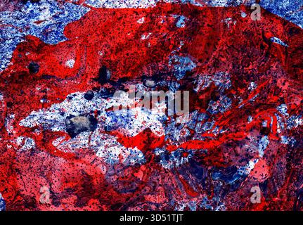 High contrast abstract grunge background in vivid red, deep blue, and white. Created with acrylic pouring, marbling technique, featuring heavy texture Stock Photo