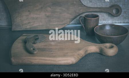 Pizza slicer with a wooden handle on a rustic wooden cutting board, close-up kitchen still life in natural light Stock Photo