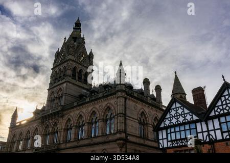 Gothic-revival Chester Town Hall rising beneath a dramatic sky Stock Photo