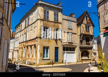Typical narrow street in Cognac Old Town in summer, France Stock Photo