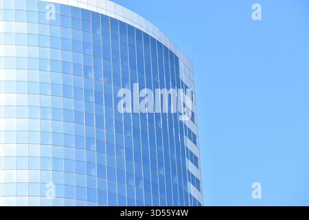 A dynamic collection of striking urban architecture, capturing the contrast between classic, ornate facades and sleek, modern glass skyscrapers. Stock Photo