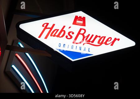 Neon Sign outside of burger restaurant HAB'S BURGER in Vienna Austria. The name a funny clever pun on the name of the Habsburg Imperial Dynasty Stock Photo
