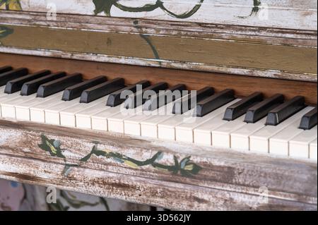 An old painted piano on the lower bluffwalk in downtown Lynchburg, Virginia Stock Photo