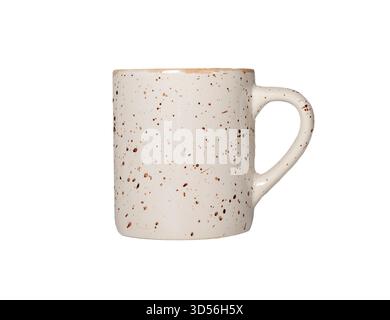 Ceramic mug. Speckled porcelain cup with handle, filled with hot coffee or tea, modern rustic design, cozy breakfast and kitchen tableware concept, is Stock Photo