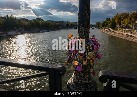 Love locks on the Pont des Arts, Paris, September 2025. There used to be love locks all the way along the railings of the bridge. However, the combine Stock Photo