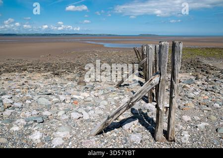Llanfairfechan coastal path and beach near Glany Mor Elias nature reserve on the North Wales coast looking towards Puffin Island Stock Photo
