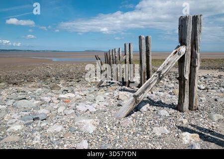 Llanfairfechan coastal path and beach near Glany Mor Elias nature reserve on the North Wales coast looking towards Puffin Island Stock Photo