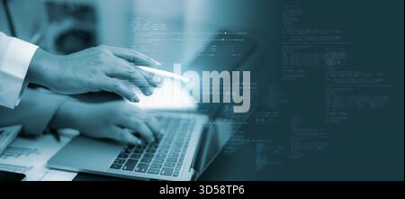 IT professional analyzing digital code with stylus and laptop, showing cybersecurity interface, software development process and programming technolog Stock Photo