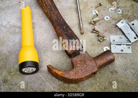 Outdoor, old grunge hammer in close up Stock Photo