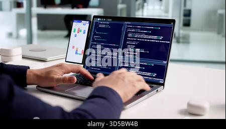 Professional Programmer Organizing Schedule And Developing Software On Laptop Stock Photo