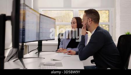 Analyzing Financial Data In Modern Medical Office With Professional Staff. Stock Photo