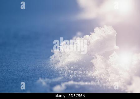 Crystalic fresh snow, shadows and light as abstract background Stock Photo