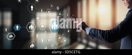 Diverse business team analyzing financial data and growth charts on digital tablet. Stock Photo