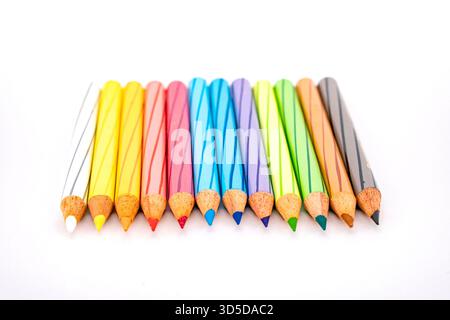 Multi colour pencils on white background Stock Photo