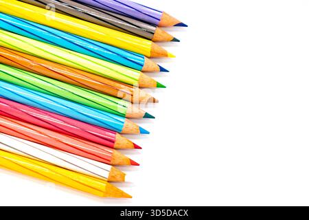 Multi colour pencils on white background Stock Photo