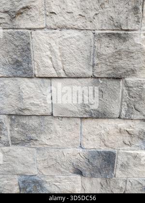 Light gray rectangular stone masonry texture vertical image great background for packaging posters web banners and architecture presentations Stock Photo