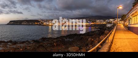 Panoramic view of La Caleta de Adeje at dusk, Tenerife, Canary Islands Stock Photo