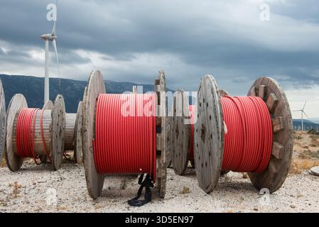 TURKEY, Karaburun near Izmir, 223 MW wind farm  of company Lodos Elektrik with Enercon E-82 wind turbines, copper cable reel of italian company Prysmian / TUERKEI, Karaburun, 223 MW Windpark der Firma Lodos Elektrik mit Enercon E-82 Windkraftanlagen, Kupfer Kabeltrommel des italienischen Kabelhersteller Prysmian S.p.A. the world leader in cable manufacturer Stock Photo