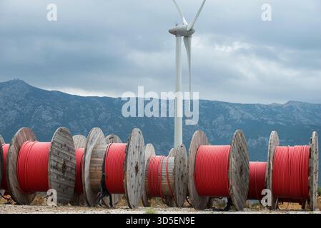 TURKEY, Karaburun near Izmir, 223 MW wind farm  of company Lodos Elektrik with Enercon E-82 wind turbines, copper cable reel of italian company Prysmian / TUERKEI, Karaburun, 223 MW Windpark der Firma Lodos Elektrik mit Enercon E-82 Windkraftanlagen, Kupfer Kabeltrommel des italienischen Kabelhersteller Prysmian S.p.A. the world leader in cable manufacturer Stock Photo