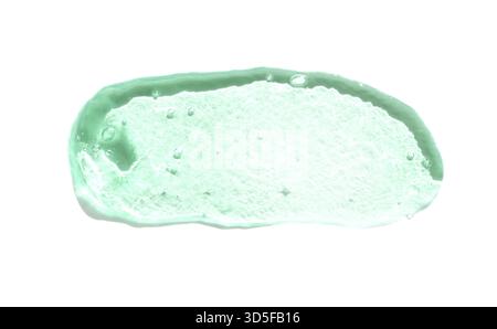 Close up of translucent green gel with air bubbles and smooth texture on white background Stock Photo
