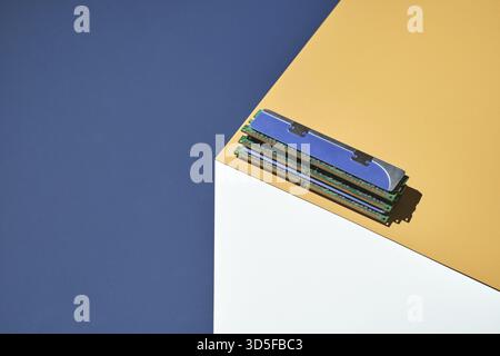 Isometry trendy cube concept. Computer memory module. Yellow and blue. Retail technology shop. Chip market. Metal pc component. Laptop inside electron Stock Photo