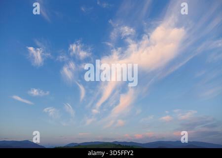 Perfect moment of the azure sky on a sunny day with clouds. Scenic image of textured sky. Ecology concept - climate change in the environment. Picture Stock Photo