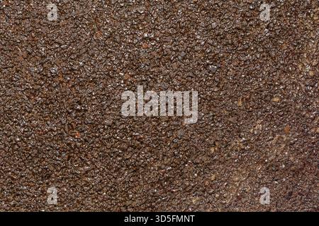 Texture of grainy, moisture-resistant sandpaper. Abrasive product for rough surface treatment. Macrophotography Stock Photo