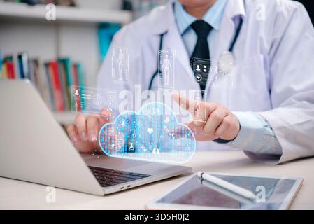 Doctor cloud computing technology for medical data management. Healthcare working digital health records, secure cloud storage, telemedicine, innovati Stock Photo