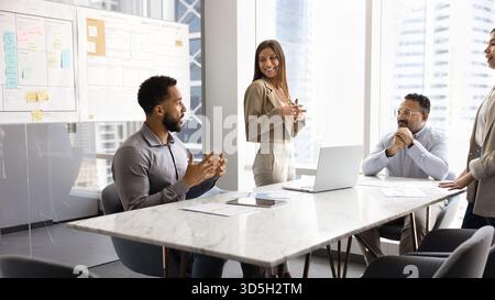 Diverse business team working on project together Stock Photo