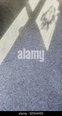 The interplay of light and shadow creates an interesting visual effect on the textured surface, perfect for backgrounds and designs Stock Photo