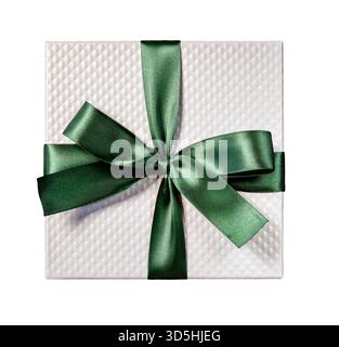 Isolation of  white textured gift box wrapped in green ribbon and bow isolated on white Stock Photo
