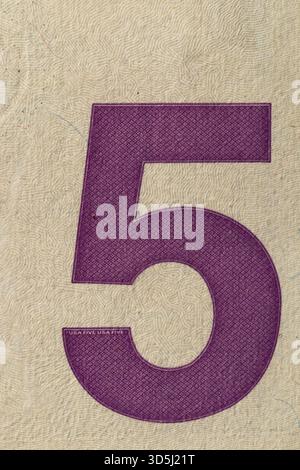 Extreme Macro of Large Purple Number Five on US Dollar Banknote Stock Photo