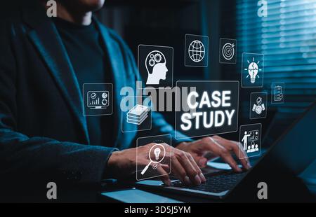 Businessman analyzing case study using laptop with digital icons. Concept for data-driven decision making, strategic learning in corporate development Stock Photo