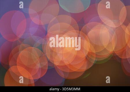 Vibrant abstract bokeh background with multicolored circular light patterns and soft glow Stock Photo