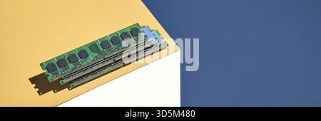 Isometry trendy cube concept. Computer memory module. Yellow and blue. Retail technology shop. Chip market. Metal pc component. Laptop inside electron Stock Photo
