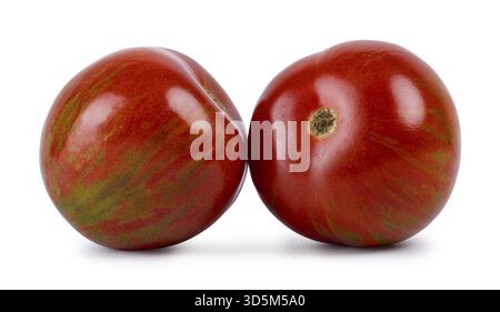 Red with green striped black zebra tomatoes, isolated on a white background, Netherlands Stock Photo