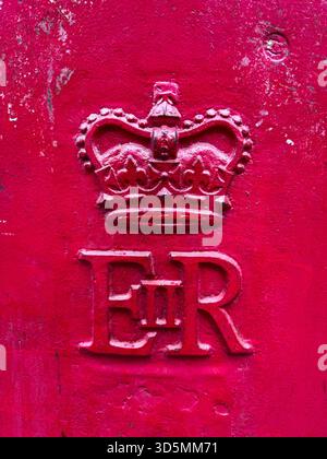 London, UK - September 10, 2025; Weathered Royal Cypher closeup for Elizabeth II on red post box Stock Photo