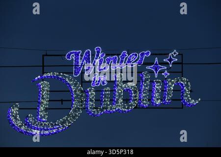 Dublin, Ireland - 12th November 2025 - A Christmas Winter in Dublin street sign on Capel Street in Dublin city centre on a dark early morning in the Irish capital Stock Photo