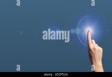Digital innovation concept. Hand touching glowing blue interface symbolizing intelligence, connection, and progress, abstract futuristic design repres Stock Photo