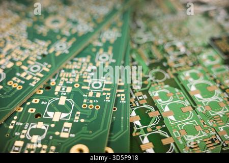 Stack of green printed circuit boards with fine details Stock Photo