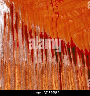 Aerial view of fiery abstract patterns cascading across the canvas, textures melding in a dance of orange and white hues, like a landscape seen from a Stock Photo