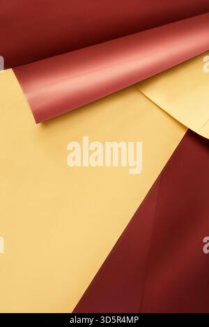 Sheets of blank yellow and brown wrapping paper closeup as a background Stock Photo