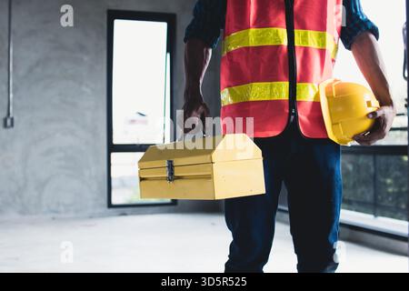 Male worker with tools box, engineer worker prepare tools Stock Photo