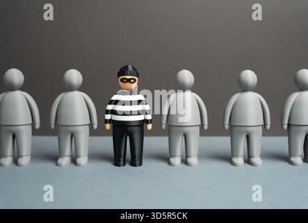 Find the culprit among all suspects. Analytical monitoring systems and AI-powered analysis. Digital investigation, data analytics, and crime detection Stock Photo