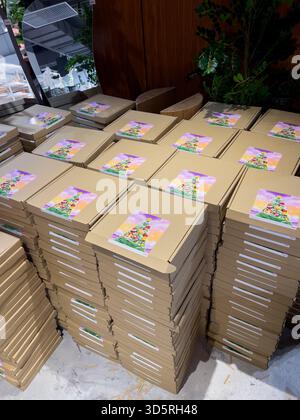 Bukit Bintang, Kuala Lumpur, Malaysia - Nov 17, 2025 : Stacks of Cardboard Boxes with Christmas Tree Stickers Stock Photo