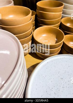 Bukit Bintang, Kuala Lumpur, Malaysia - Nov 17, 2025 - Stacked Ceramic Bowls and Plates on Display Stock Photo