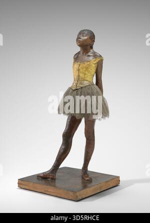 This 1878–1881 sculpture by Edgar Degas depicts a fourteen-year-old dancer in a standing pose. Made with pigmented beeswax over a metal armature, the figure includes human hair, silk and linen ribbons, a cotton bodice and tutu, and is mounted on a wooden base, reflecting Degas’ interest in ballet and realism. Stock Photo
